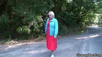 older blond hitchhiker doggy-fucked outside